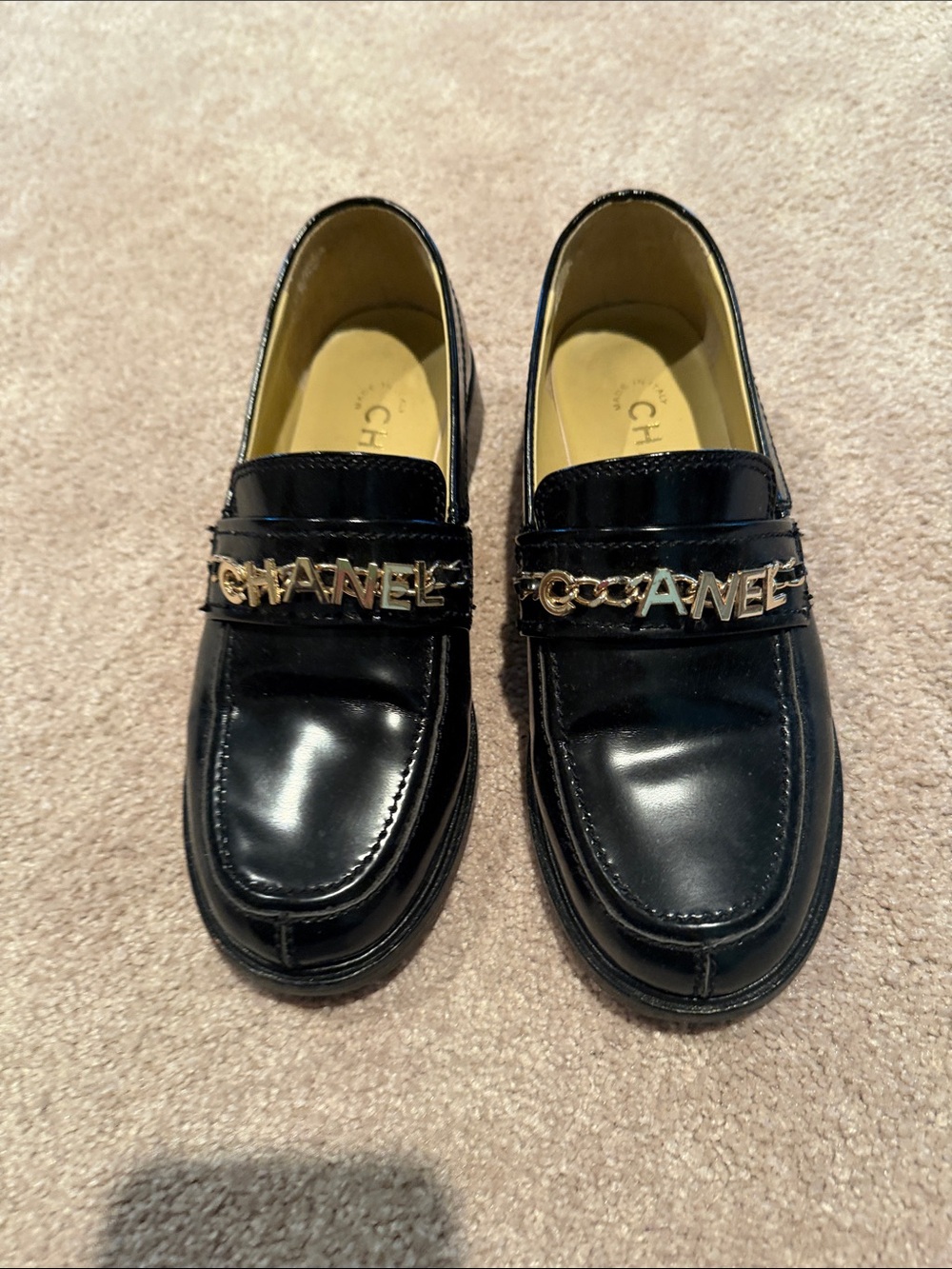 CHANEL Black Leather Logo Chain Loafers